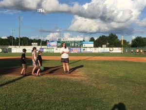 The kids and I waiting to throw out the first pitch at an Edenton Steamers game.